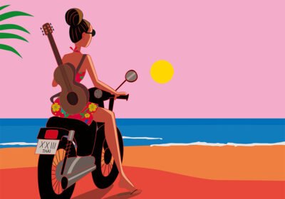 a woman on a bike looking a sunset on the beach, to illustrate the travel blog